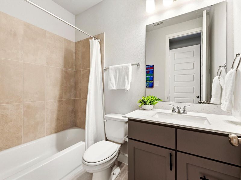 En suite bathroom for your guests or mother-in-law.