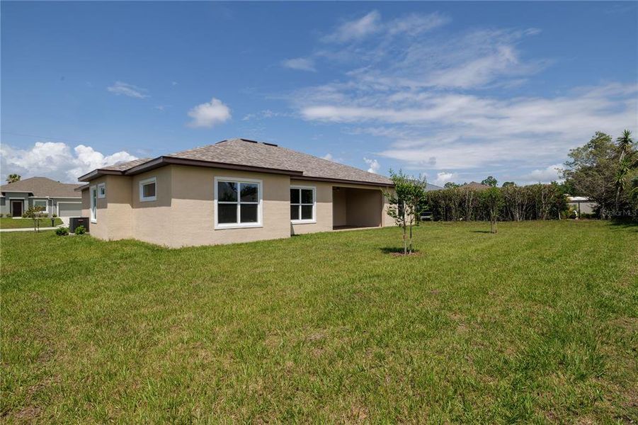 Exterior details and patio area of a home in , Palm Coast (Image 22). Exterior details and patio area of a home in , Palm Coast (Image 22).