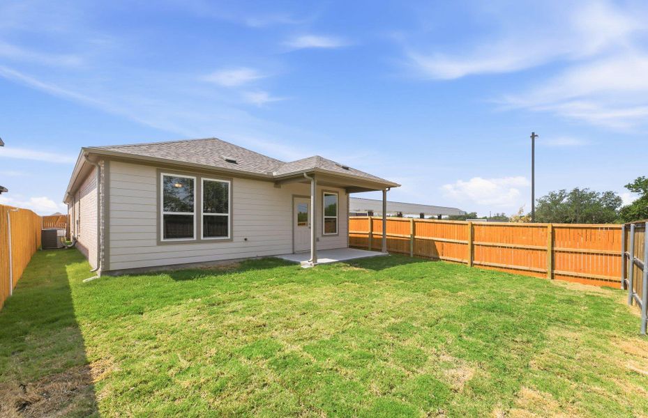 Exterior details and patio area of a home in Crosswinds, Kyle (Image 2). Exterior details and patio area of a home in Crosswinds, Kyle (Image 2).