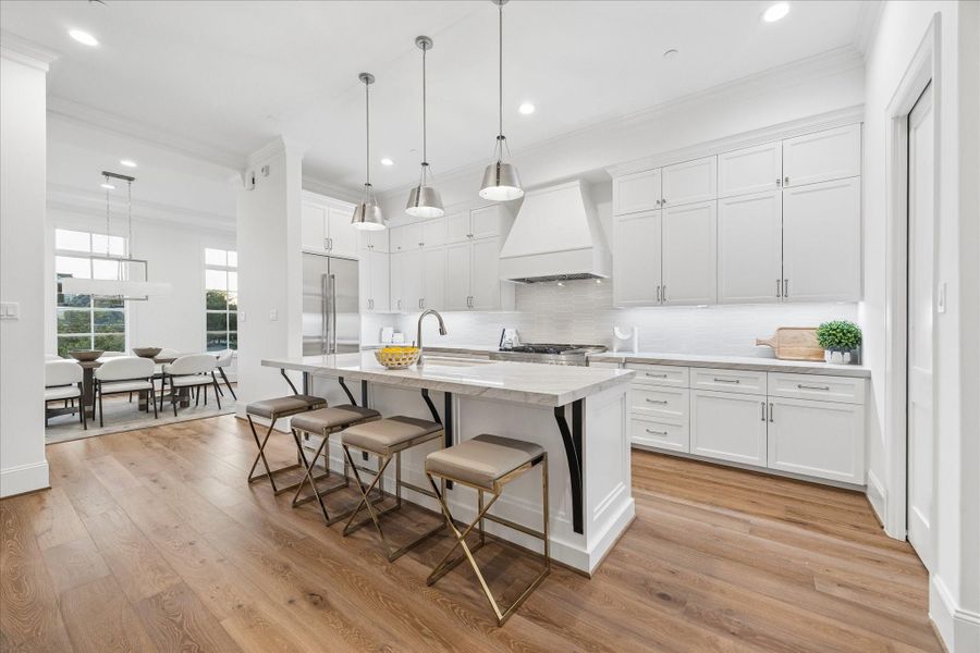 Gorgeous open kitchen! 2nd floor features large living spaces including kitchen, dining and living + half bath.