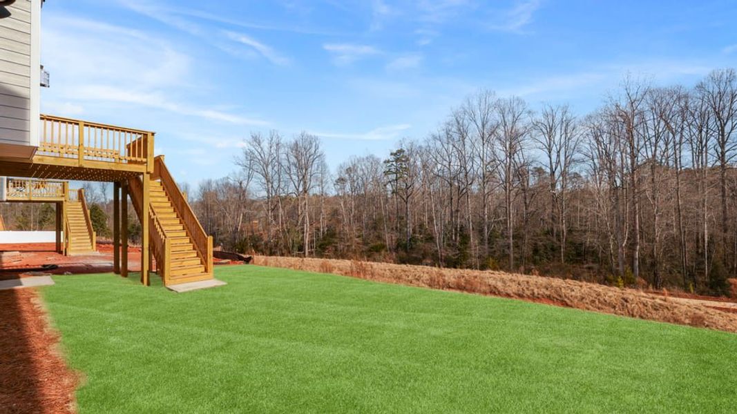 Exterior details and patio area of a home in Whitehawk Meadows, Travelers Rest (Image 25).