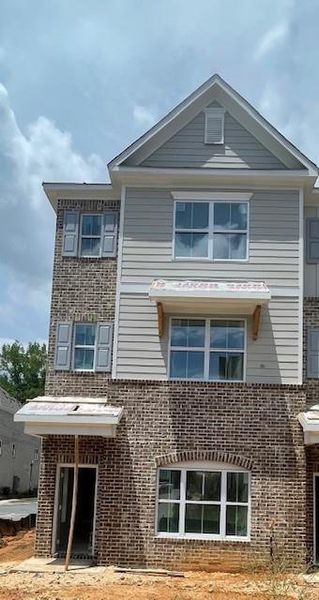 In-progress construction of a new home in Townes at South Main, Kennesaw, GA (Image 29).