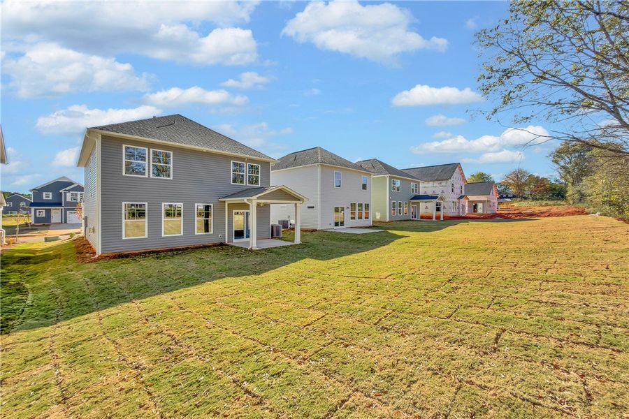 Exterior details and patio area of a home in Brownstone Park, Easley (Image 3). Exterior details and patio area of a home in Brownstone Park, Easley (Image 3).