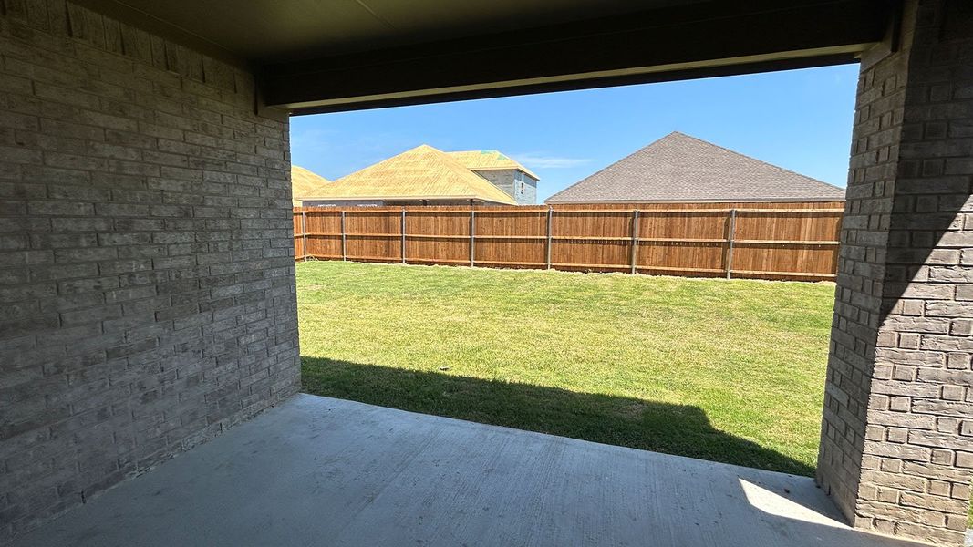 Exterior details and patio area of a home in Trailstone, Caddo Mills (Image 3).