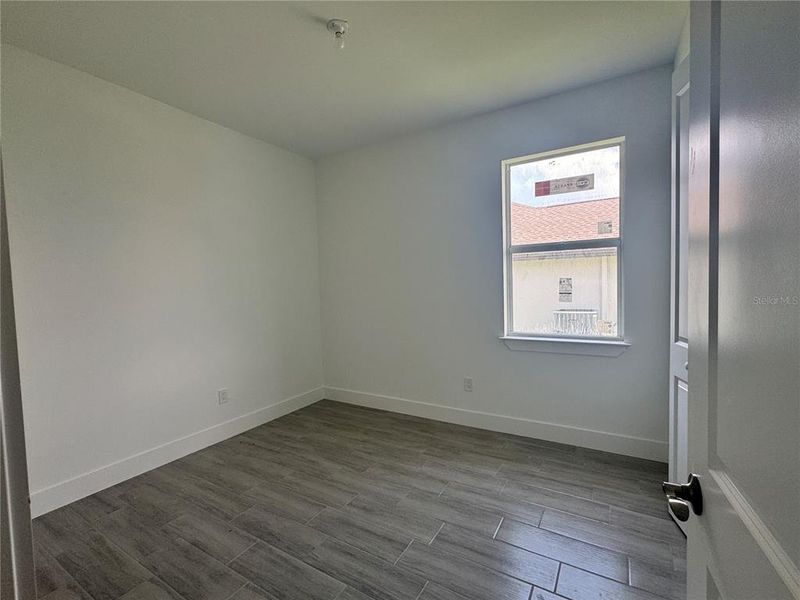 Spacious, unfurnished interior of a new home in , Port Charlotte (Image 24).