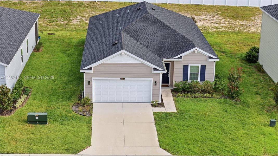 Front exterior of a new home in , Ocala, FL, highlighting curb appeal (Image 2). Front exterior of a new home in , Ocala, FL, highlighting curb appeal (Image 2).