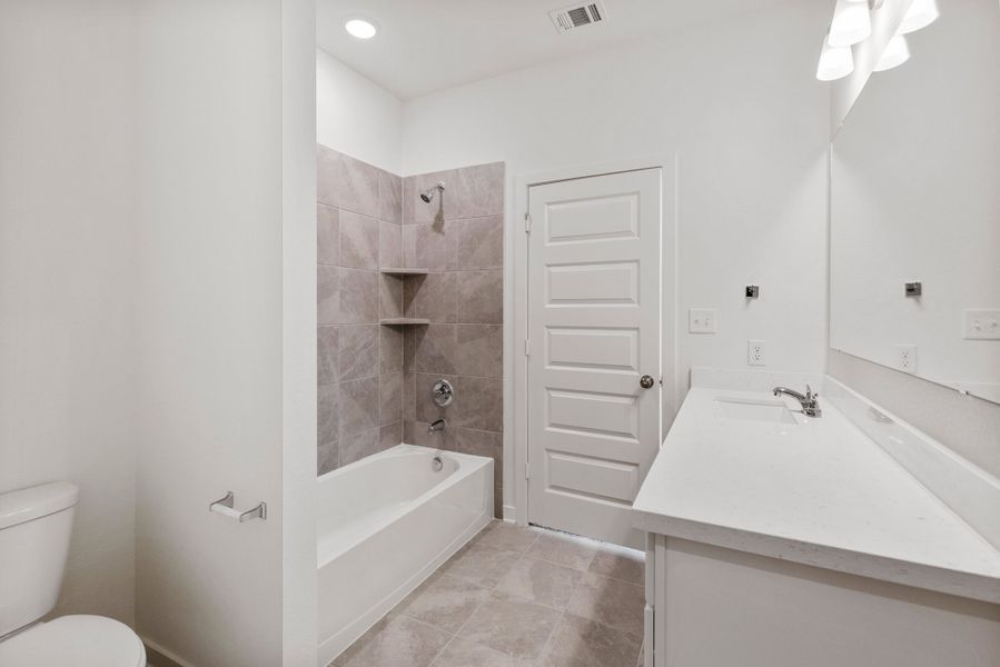 Representative furnished interior of a home built from the The 1340 by Stylecraft Builders in Townhomes at Yaupon Trails, Bryan (Image 6).