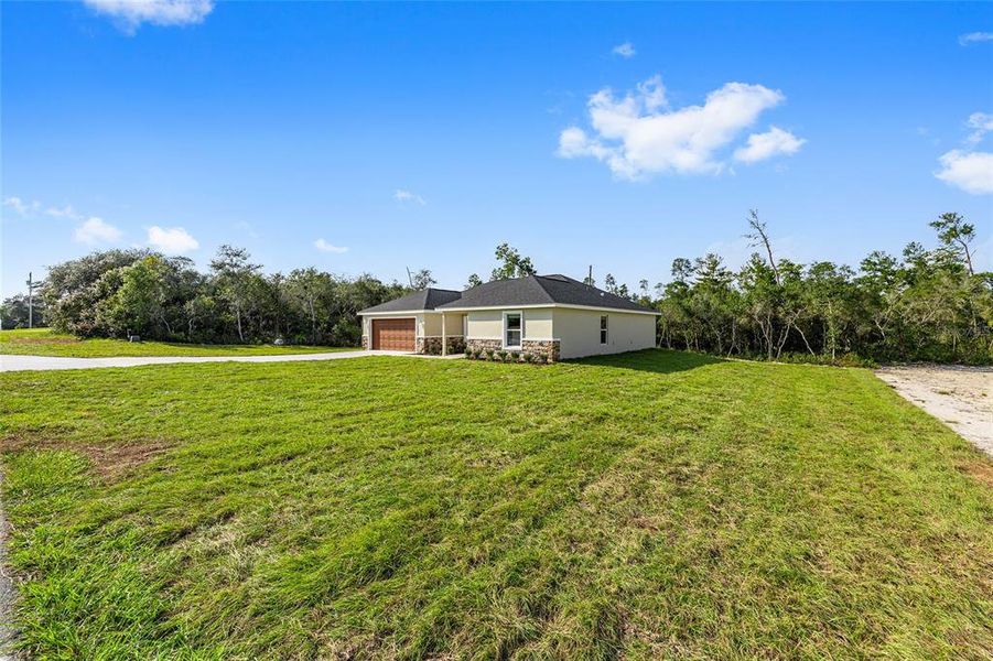 Exterior details and patio area of a home in , Ocala (Image 32).