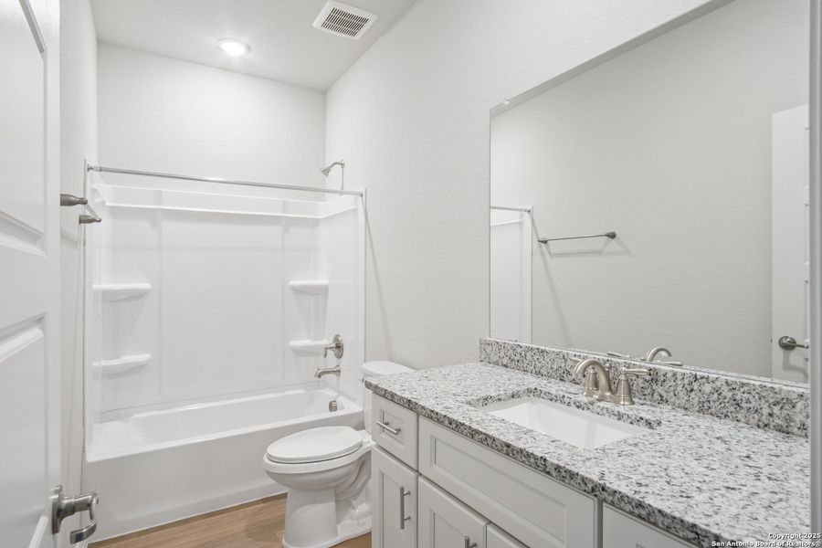 Furnished interior view inside a new home in Magnolia Village North, San Antonio (Image 8).