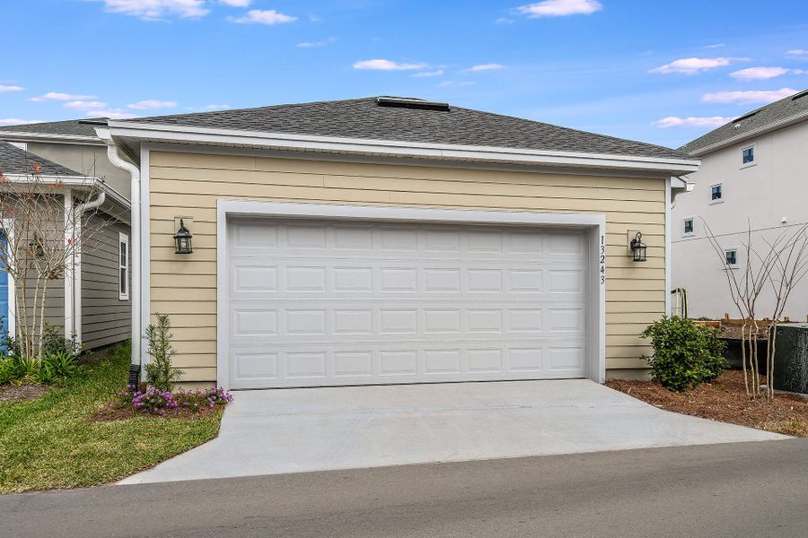 Representative exterior details of a home built from the The Kahneman II by David Weekley Homes in Laureate Park at Lake Nona - Garden Series, Orlando (Image 4).
