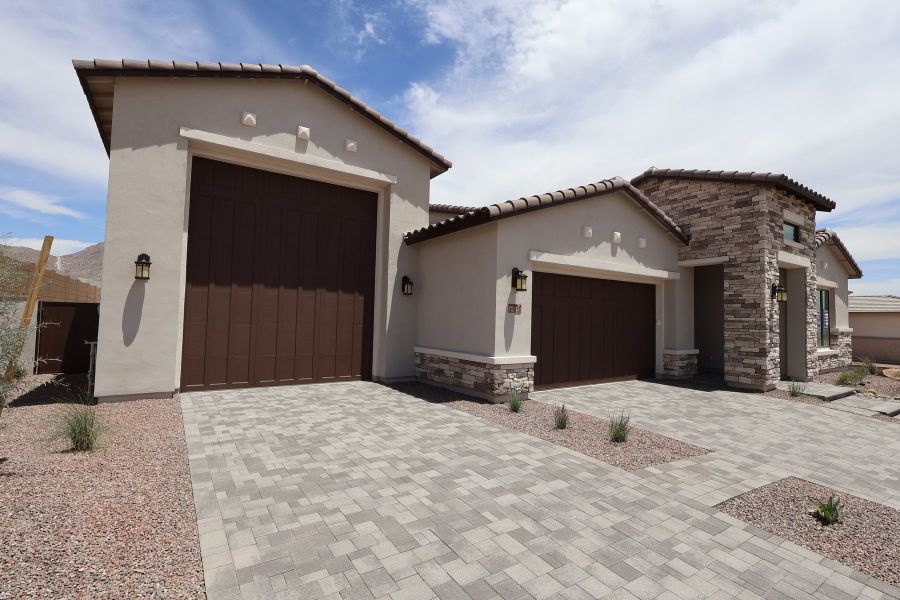 Front exterior of a new home in Alta at Verrado Regent Hills, Buckeye, AZ, highlighting curb appeal (Image 6). Front exterior of a new home in Alta at Verrado Regent Hills, Buckeye, AZ, highlighting curb appeal (Image 6).
