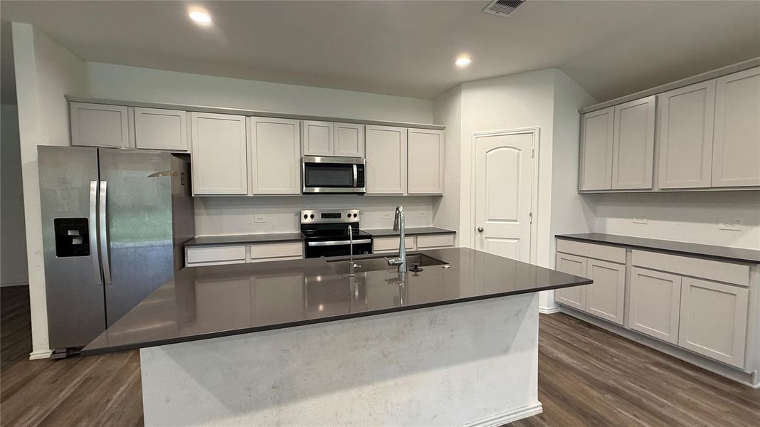 Furnished interior view inside a new home in , Conroe (Image 4).