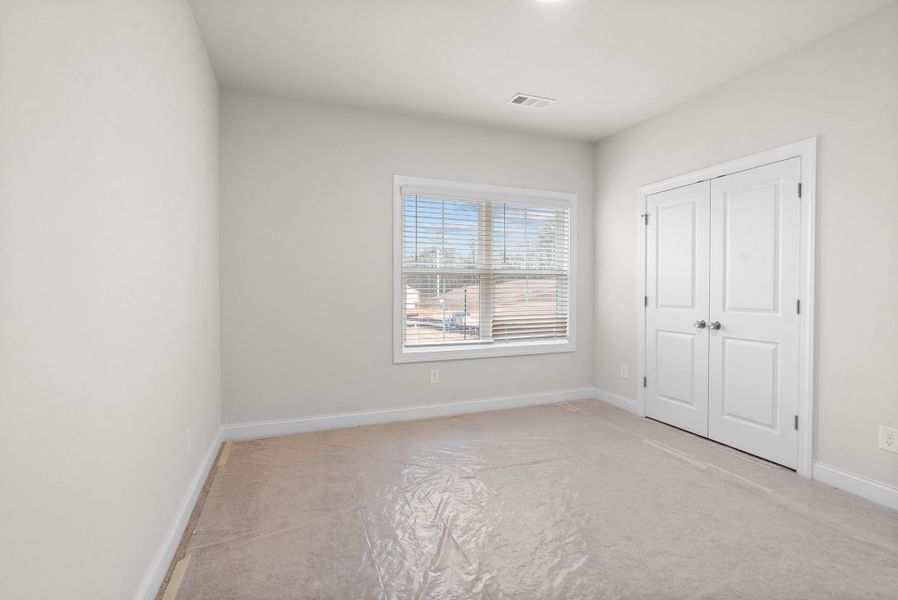 Representative unfurnished interior of a home built from the The Cantrell by The Providence Group in Aberdeen, Hoschton (Image 32).