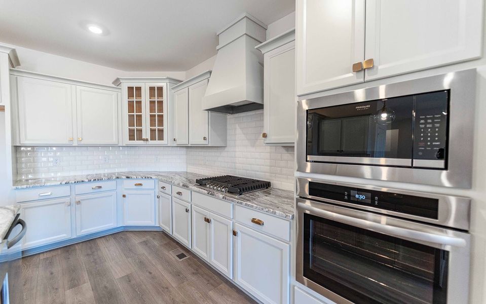 Furnished interior view inside a new home in Aden Woods, Fairview (Image 8).