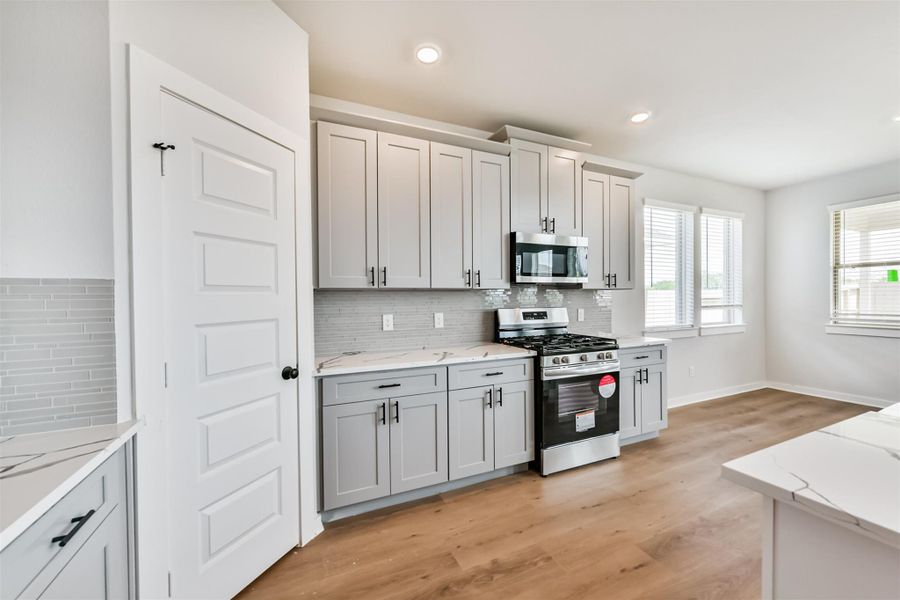 Furnished interior view inside a new home in , Manvel (Image 6). Furnished interior view inside a new home in , Manvel (Image 6).