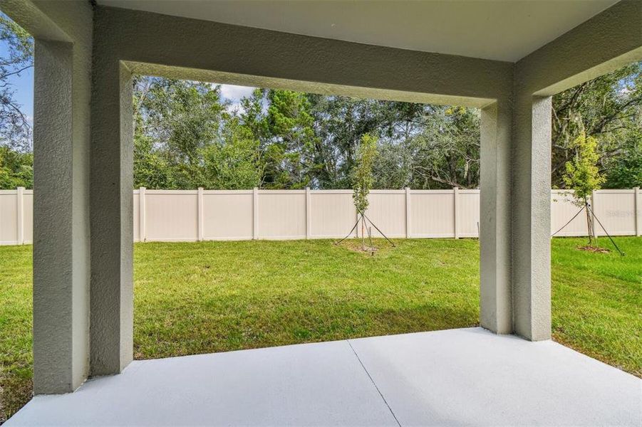 Exterior details and patio area of a home in Meadow Oaks, Hudson (Image 4).