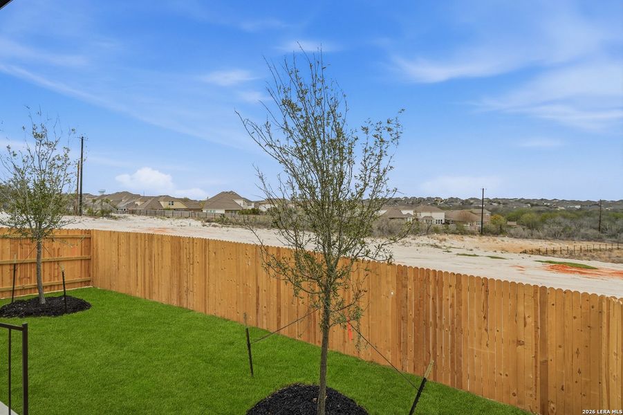 Exterior details and patio area of a home in Prominence, San Antonio (Image 3).