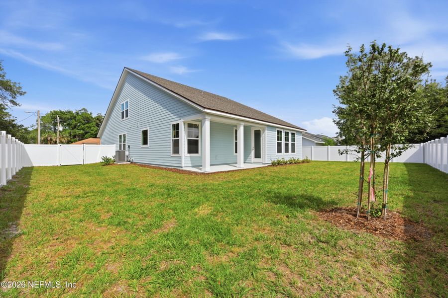 Exterior details and patio area of a home in Palm Coast Homes, Palm Coast (Image 30).