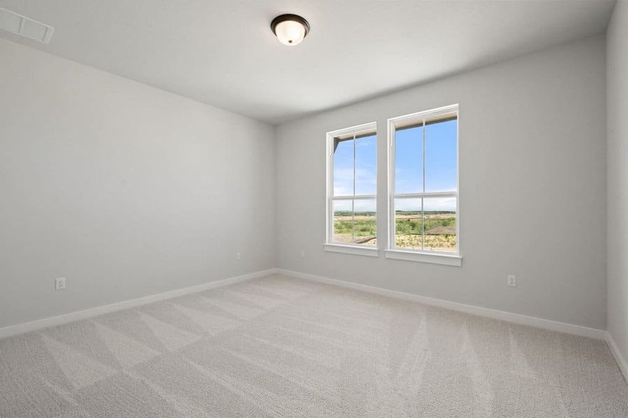 Spacious, unfurnished interior of a new home in Terrace Collection At Turner's Crossing, Buda (Image 44).