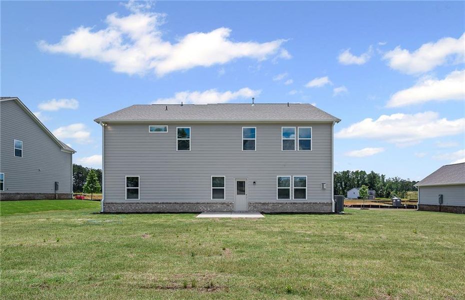 Exterior details and patio area of a home in Anderson Point Estates, McDonough (Image 3).