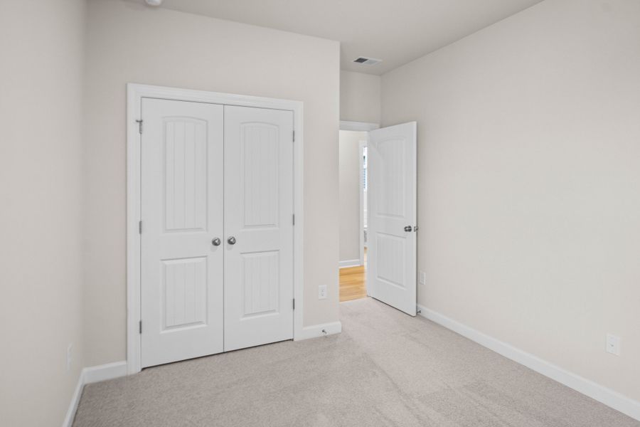 Spacious, unfurnished interior of a new home in Coastal Club of the Carolinas, Calabash (Image 20).