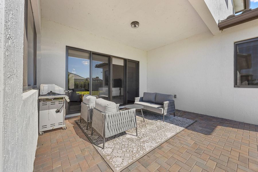 View of patio / terrace with an outdoor living space and area for grilling