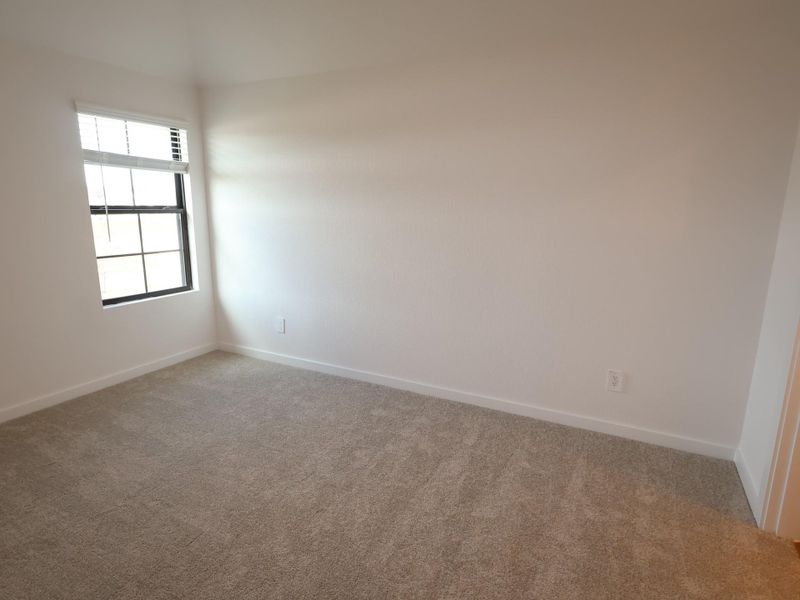 Spacious, unfurnished interior of a new home in Lone Star Landing, Montgomery (Image 38).