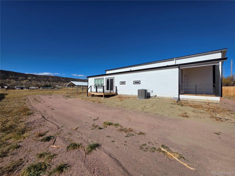 Exterior details and patio area of a home in , Cañon City (Image 18).