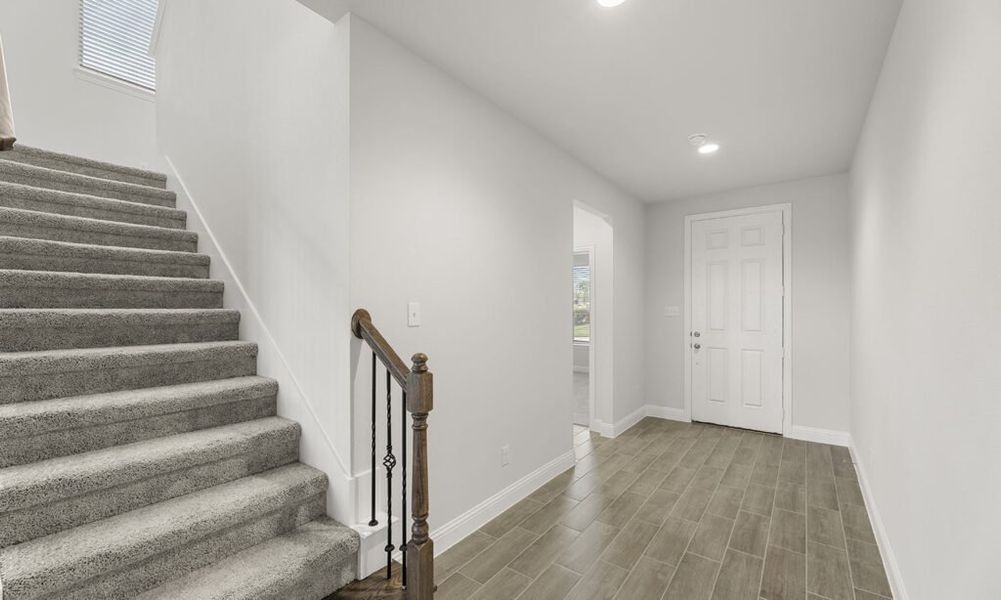 Representative exterior photo of a completed home built from the Brighton by Impression Homes in Arcadia Trails, Balch Springs, TX (Image 14).