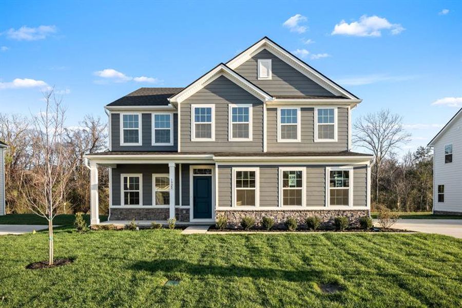 Front exterior of a new home in Muirwood, Murfreesboro, TN, highlighting curb appeal (Image 1). Front exterior of a new home in Muirwood, Murfreesboro, TN, highlighting curb appeal (Image 1).