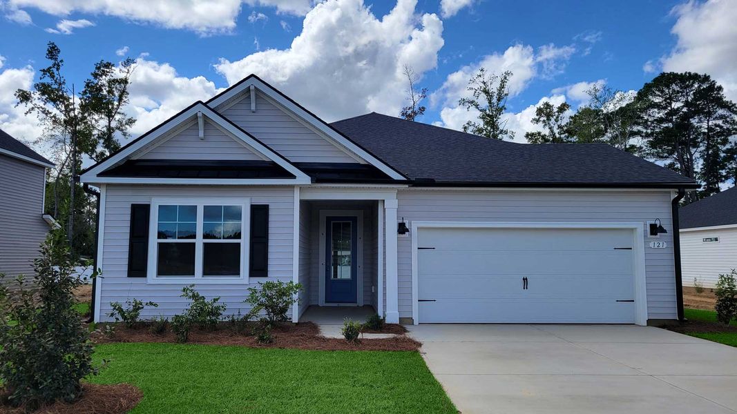 Front exterior of a new home in Coastal Farms, Conway, SC, highlighting curb appeal (Image 1).