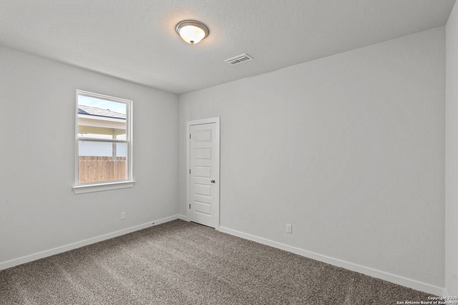Spacious, unfurnished interior of a new home in Talley Fields, San Antonio (Image 20).