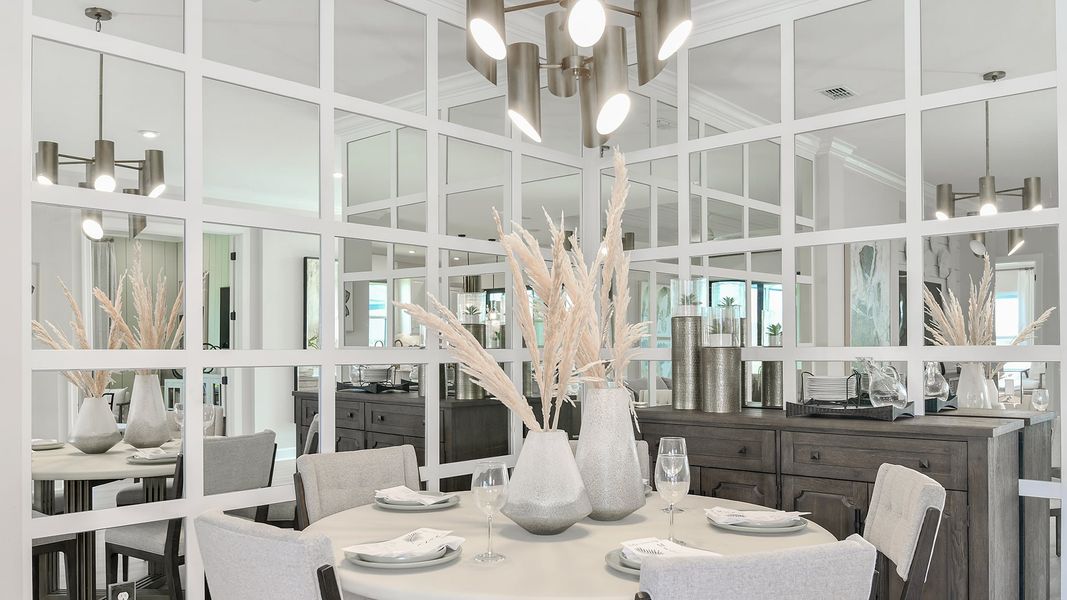 Furnished interior view inside a new home in Esplanade at Tradition, Port St. Lucie (Image 10).