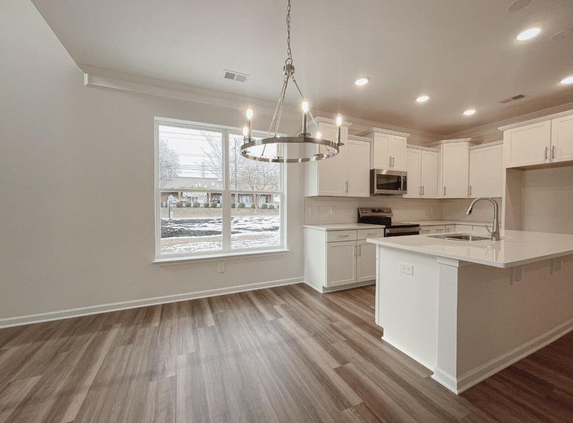 Furnished interior view inside a new home in East Main Townes, Spartanburg (Image 8).