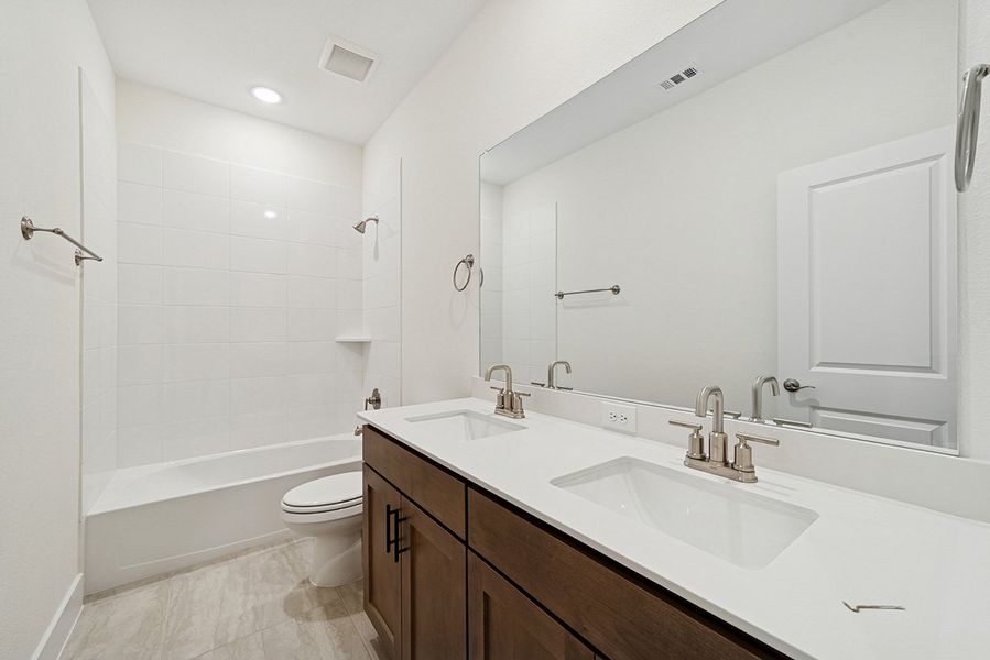 Representative furnished interior of a home built from the Riseley by Landon Homes in Fields - East Village, Frisco (Image 11). Representative furnished interior of a home built from the Riseley by Landon Homes in Fields - East Village, Frisco (Image 11).