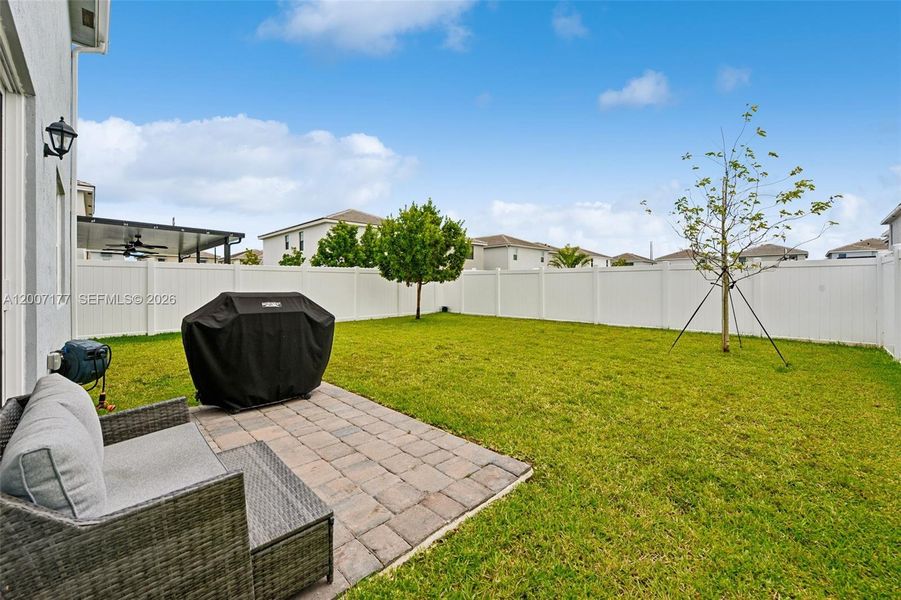 Exterior details and patio area of a home in Messina Place, Homestead (Image 28).