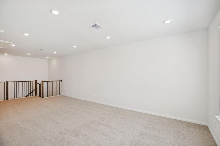 Spacious, unfurnished interior of a new home in Pinewood Trails - Luxe Series, Atascocita (Image 31).