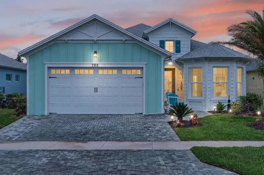Front exterior of a new home in , Daytona Beach, FL, highlighting curb appeal (Image 29).