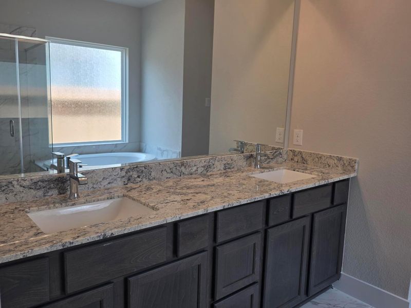 Furnished interior view inside a new home in Barton Creek Ranch, Conroe (Image 7).