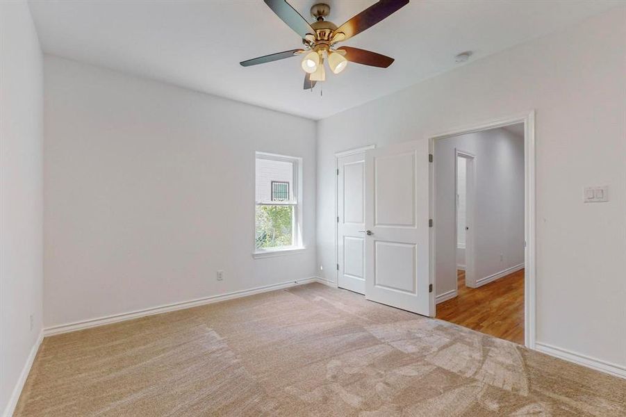 Unfurnished bedroom #4 featuring light carpet and ceiling fan