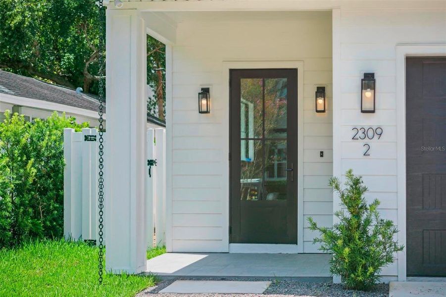 Front exterior of a new home in , Tampa, FL, highlighting curb appeal (Image 17).
