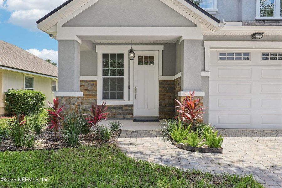 Front exterior of a new home in , Orange Park, FL, highlighting curb appeal (Image 26). Front exterior of a new home in , Orange Park, FL, highlighting curb appeal (Image 26).
