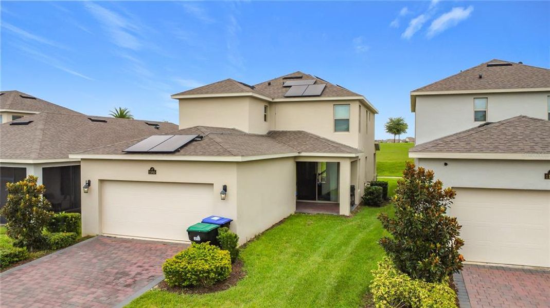 Front exterior of a new home in , Winter Garden, FL, highlighting curb appeal (Image 20).