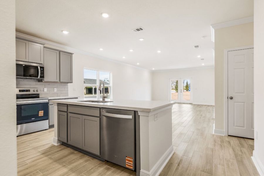 Furnished interior view inside a new home in Natureview, Freeport (Image 14).