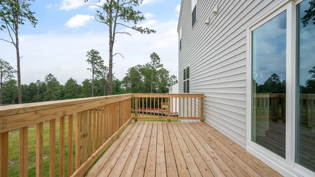 Exterior details and patio area of a home in Gretchen Pines, West End (Image 4). Exterior details and patio area of a home in Gretchen Pines, West End (Image 4).