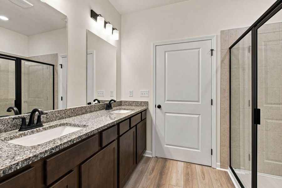 These pictures are of another unit of the same floor plan. Design selections will vary.
