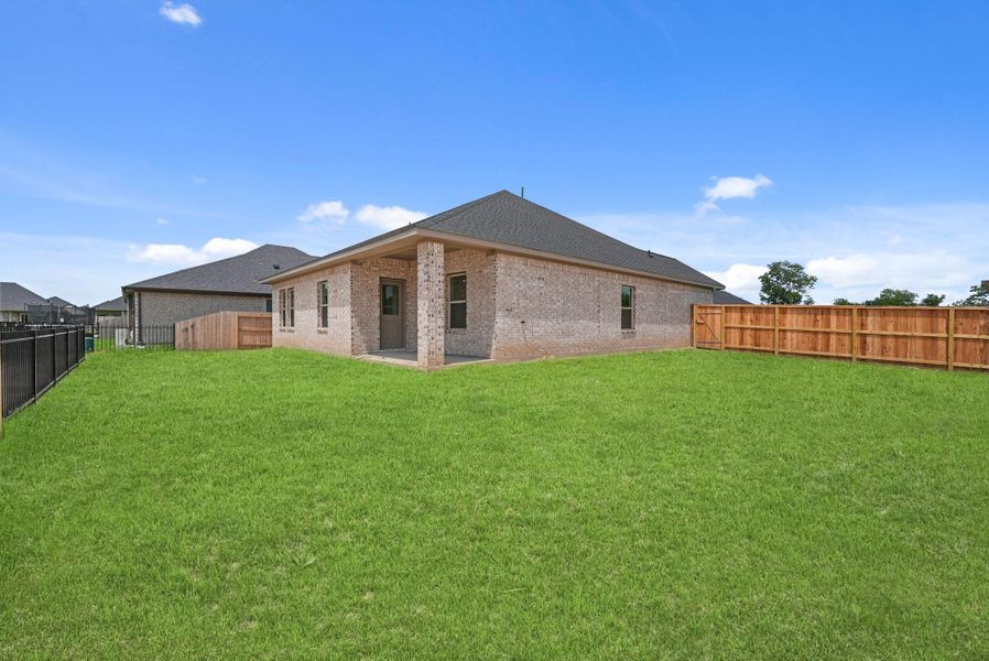 Exterior details and patio area of a home in Laurel Landing, Alvin (Image 4). Exterior details and patio area of a home in Laurel Landing, Alvin (Image 4).