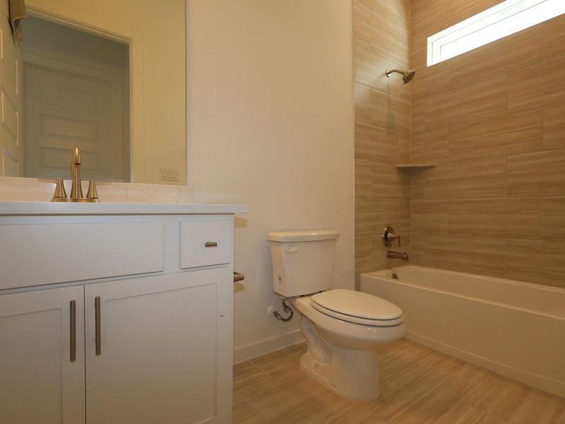 Furnished interior view inside a new home in Heritage, Dripping Springs (Image 19).