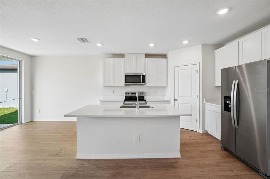 Furnished interior view inside a new home in Pine Ridge Meadows, Hudson (Image 9).