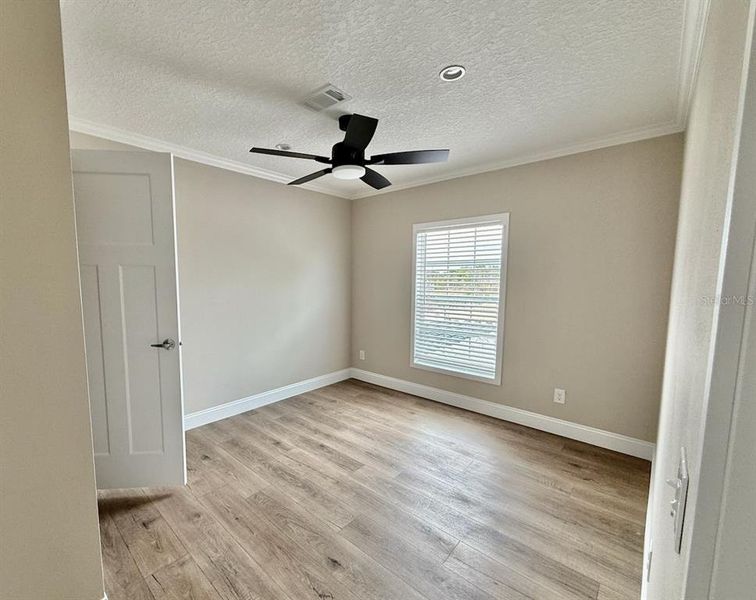 Spacious, unfurnished interior of a new home in , Okeechobee (Image 21).